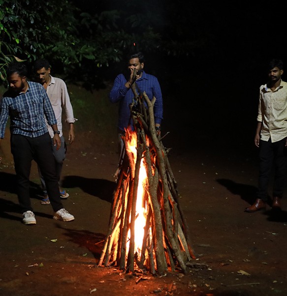 Gather around a camp fire, play anthashari on a foggy night, and dance to music under the night sky with the fire crackling in the background.