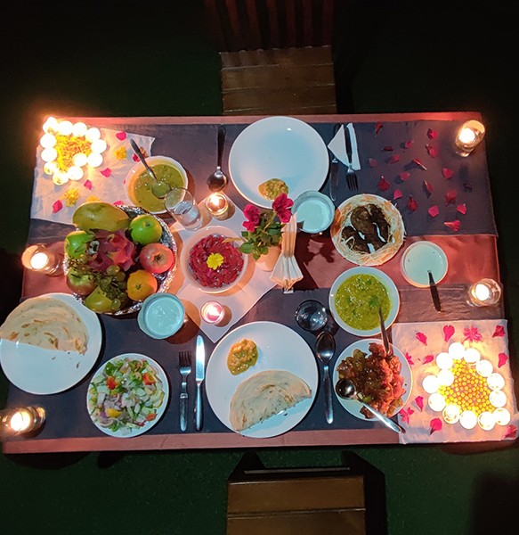 Have a romantic candle-lit dinner beneath coffee trees.